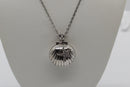 Sterling Silver Cubic Zirconia Clam Shell Pendant